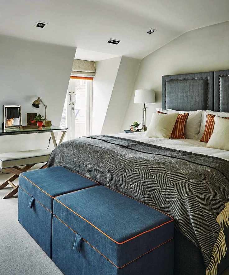 Upholstered storage ottoman in jewel tone