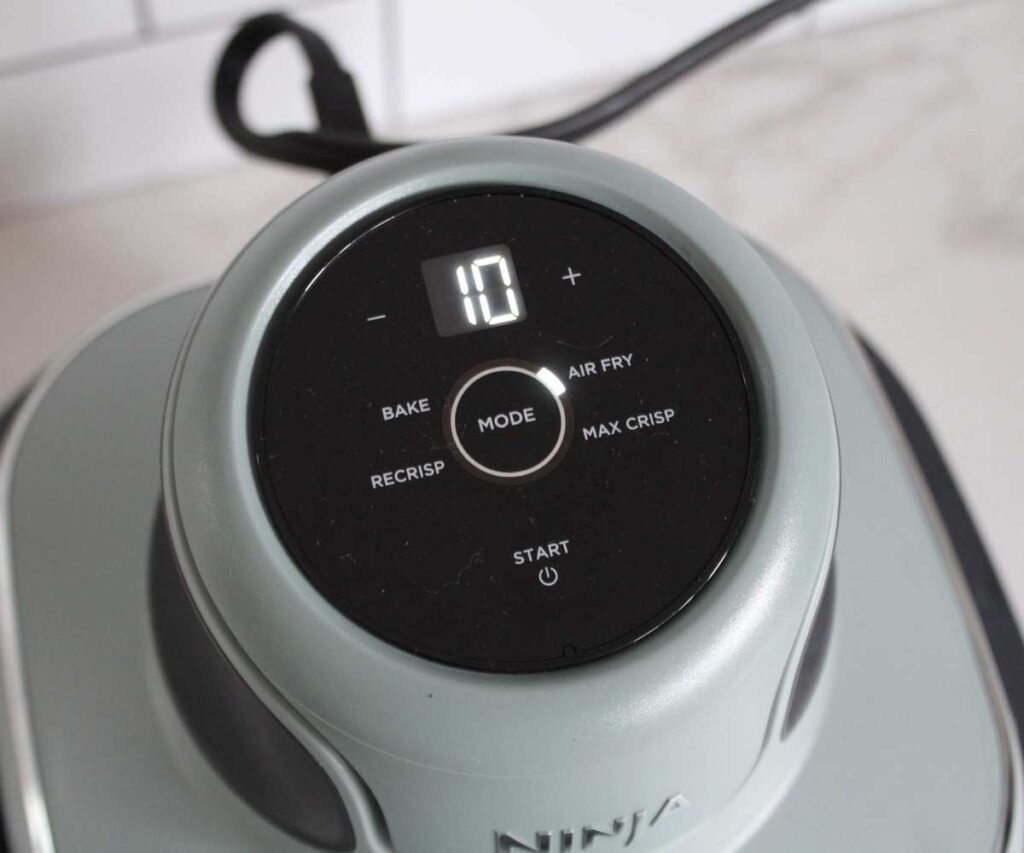 The control panel on the Ninja Crispi Portable Glass Air Fryer